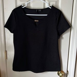 Black knit blouse with short sleeves